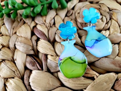 Blue Flowers in Blue and Green Vase - Image 2