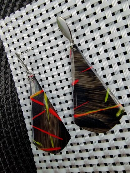 Metallic black cones with pink and yellow